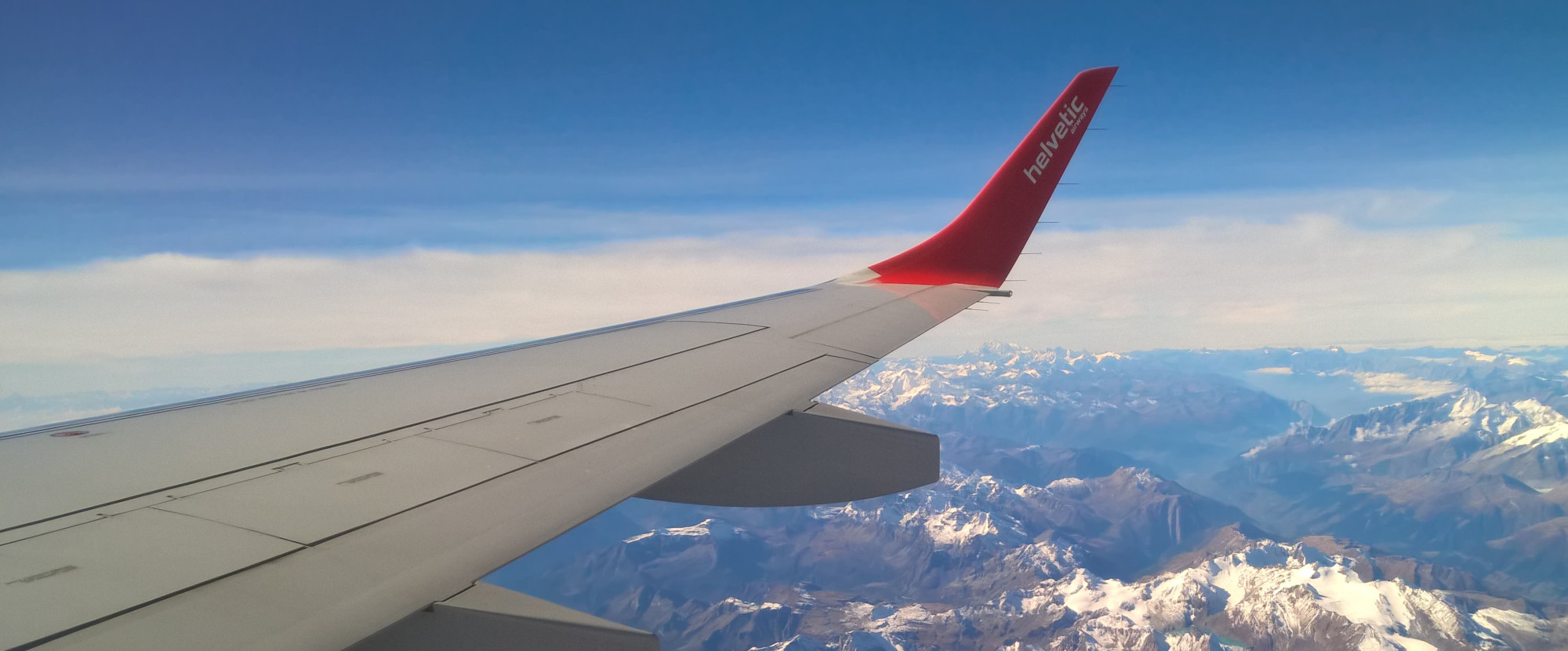 Aircraft Wing in Flight - Photo by Andrea Vincenzo Abbondanza on Unsplash